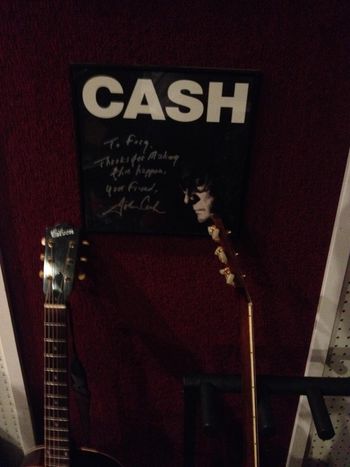 Johnny Cash signed poster right next to where I sat
