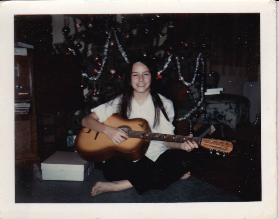 IN CASE YOU'RE UNSURE ABOUT COMING TO ONE OF MY WINTER/CHRISTMAS SHOWS...HERE'S ME AT AGE 11 WITH MY FIRST GUITAR PARCTICING IN FRONT OF A CHRISTMAS TREE!!!  COMMITMENT!!!!