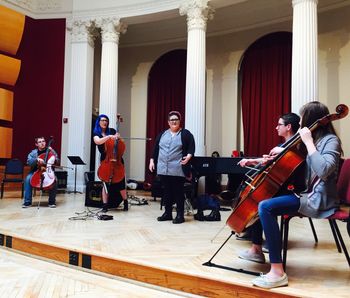 Emily Hope Price invited some young cellists and an audience member to join her on stage for a free improvisation workshop
