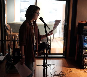 Flannery recording a scratch track for her vocals on "Staring at the Sun"
