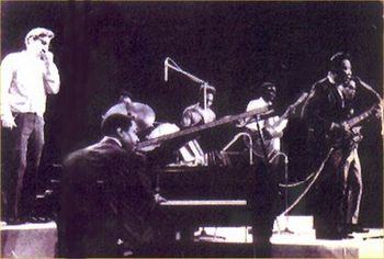 LEFT TO RIGHT: PAUL, OTIS SPANN, SP. LEARY, PEE WEE MADISON, SONNY WIMBERLY, MUDDY WATERS AND LUTHER "GEORGIA BOY SNAKE" JOHNSON - GERMANY 1968
