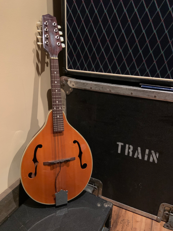 mandolin played on early Train club shows and the debut album (I Am)

