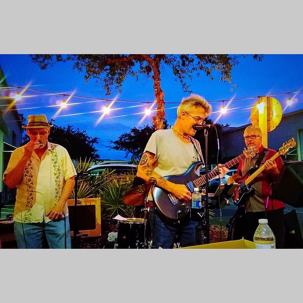 The magic of music under a moonlit sky as The Flim-Flam Kings play at Naples Beach Brewery, a favorite of craft beer lovers, music fans and family oriented listeners.