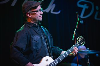 Dave Pollon on lead guitar. Photo by Dylan Randolph

