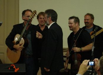 Dave chats up Gerry Adams.  Mike wants in.
