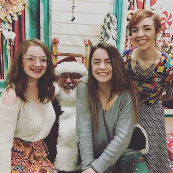 Taking a break from playing seasonal music at the Holiday Style Marketplace to visit Santa with two of my sisters!
