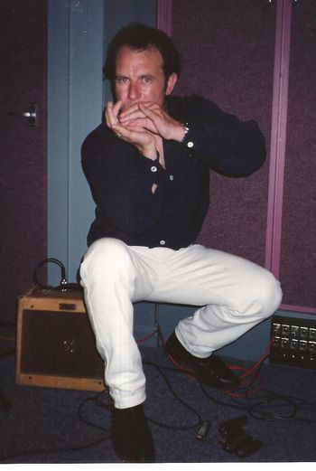 Mark Feltham on harmonica
