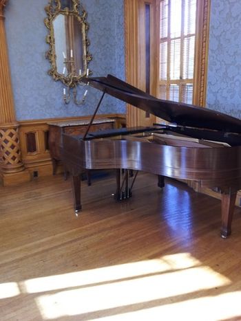 The recently restored Hay House grand piano. Beautiful wood finish and rich tone.
