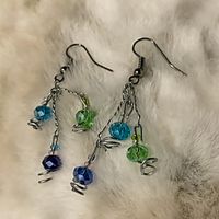 Green and blue dangle earrings