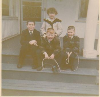 With some cousins on the steps on my grandparents house in Staten Island.
