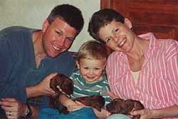 Young family with very young puppies.
