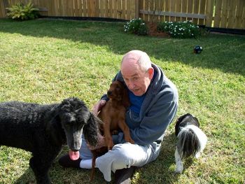 "Meaghan" with Robin's dad. He raise those girls right. Robin has had 3 of my Irish Setters, and her sister Karen has one, Skylar, my Remy's brother.
