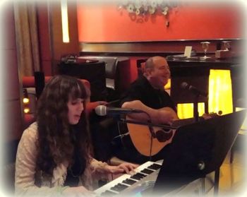 Performing at the Glen Bar in Teaneck Marriott as part of the 'Mitch & Lara' vocal/piano & guitar duo at a St. Patrick's Day Celebration event, March 17, 2018
