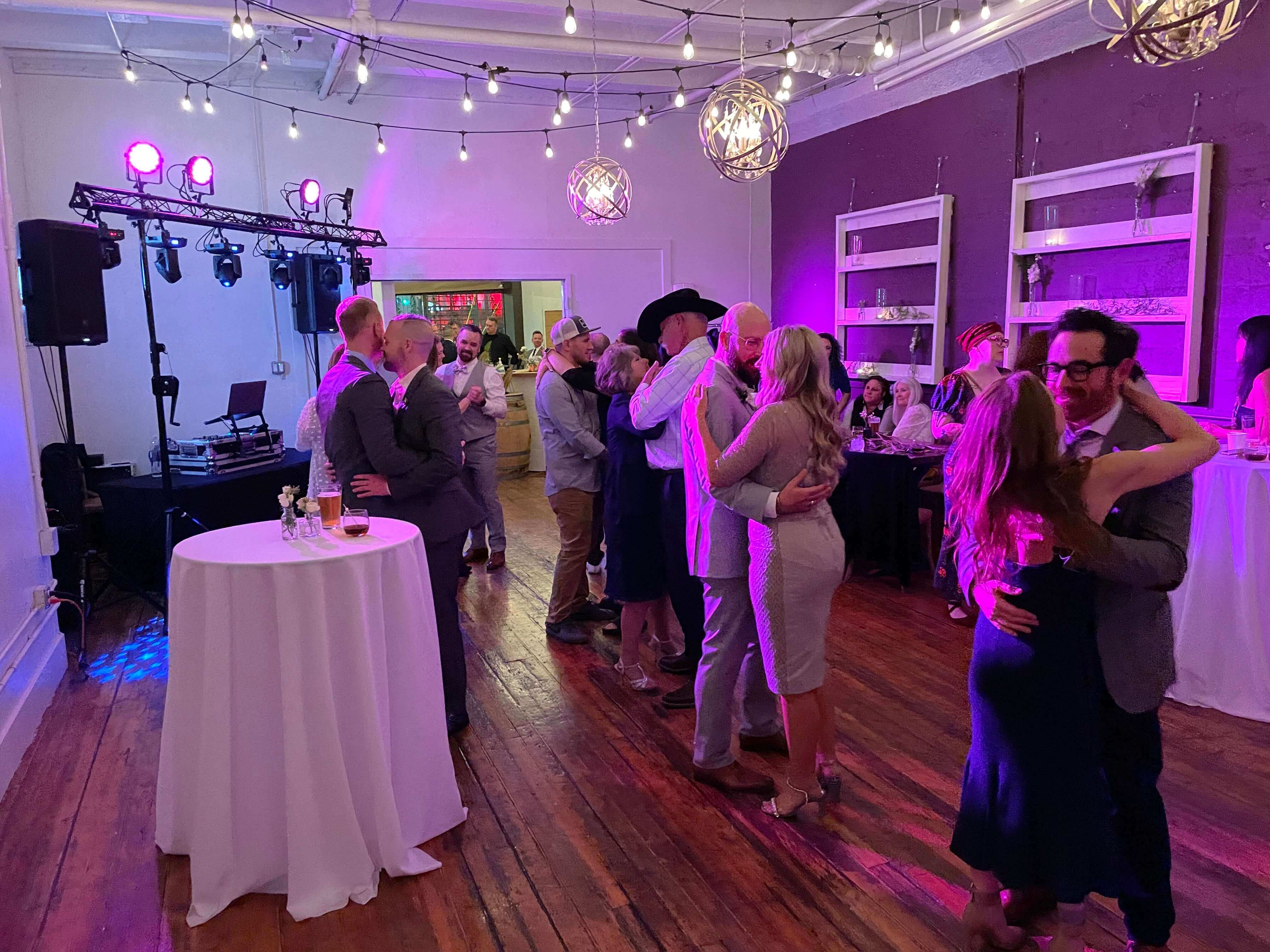 guests dancing at wedding reception 