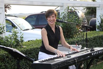 Pumpkin Carving Party Healdsburg, Ca. 2010. Lindy at her keyboard. Photography by: Rick Tang
