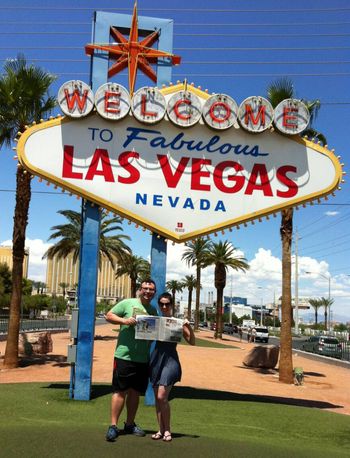 Holding the two page article about us in the Las Vegas Neon
