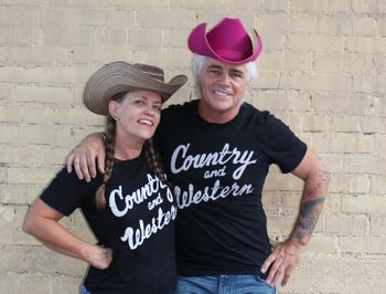 Modern-day legend Dale Watson tries on one of Teri's hats. They share the same hat size and good taste in music -- Country and Western! (Dalynn Grace)
