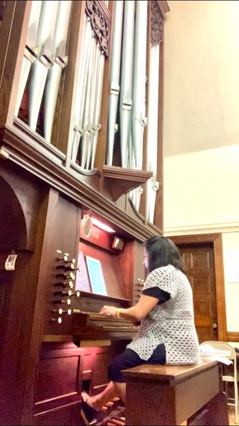Rehearsing organ music to play for a wedding ceremony in Connecticut
