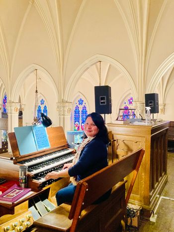 Subbing for a music director for this Catholic Mass as a cantor and organist at this high-tech organ that has its registration controlled by a computer
