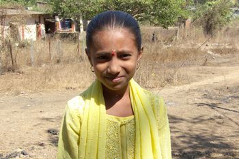 Impeccably dressed young girl in Ganeshpuri
