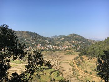 Traditional farming in a valley in Nepal.
