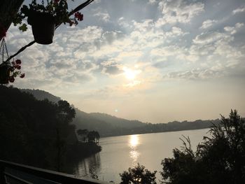 A picture of the sun setting on Lake Pokhara in the Anapurna Region of Nepal.
