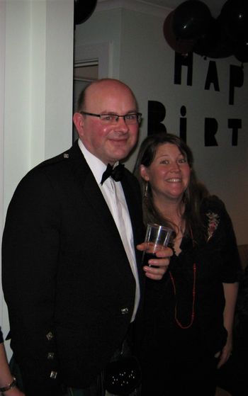 Colin in traditional Scottish evening wear with kilt for a very special occasion celebrating with friends
