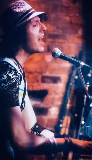 singin' "Your Wonderfulness" at The Bitter End in Greenwich Village, New York City
