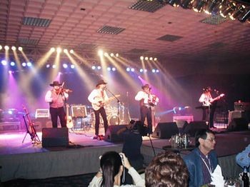 2003: Onstage at the WFA Convention in San Diego. We were very
honored to be asked to perform during the WFA Awards
Dinner.

We're out in Arizona this week, then headed home for
awhile! Be sure to come out and say hello soon!!
