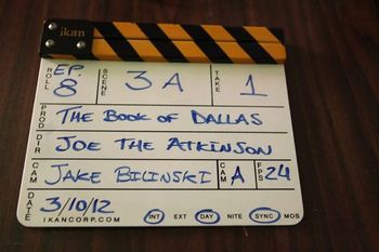 The very famous Book of Dallas clapperboard.
