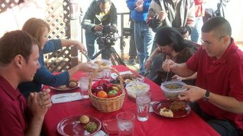 Dinner on the Andrews' deck. It was only 30 degrees, but the scene had to be shot outdoors. Notice the cast shivering, and the crew bundled up. The fare was day-old KFC, in case you're wondering.
