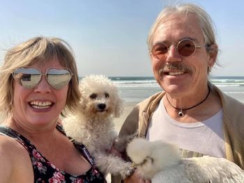 Lisa the dog and Gertie the chicken at the beach
