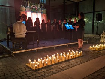 Sabaudia, Italy, June 15 2024: Hathaway Brown Choir on tour performs "Antologia Pontina" and other songs outside the Town Hall.
