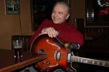 Enjoying a pint at the old Steinhaus. The guitar is a Welson in case you're wondering.
