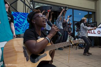 The Artist: B. Soleil passionately leads a chant during a tense lockdown urging policy makers to stop fracking and keep fossil fuels in the ground. (Keep It In The Ground Rally, Lakewood, CO, 2015).
