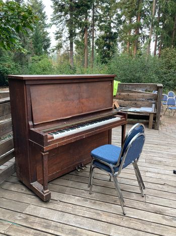 Carting the piano outside for the talent show at Strength for the Journey retreat for people living with HIV/AIDS at Suttle Lake United Methodist Camp (Summer 2023)
