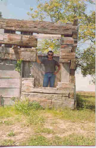 Muddy Water's Childhood home @ Stovall Farm, just out of Clarkdale Mississippi. That clever Billy Gibbons Came around about the same time (it was tagged by the county for tear down) this pic was taken, and scored some of the big timbers with which he had some guitars made. Man, he sure is clever. I took a floorboard from where I was standing in the pic. I guess I could have rulers made? Or a spatula? 1991
