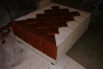 In process: tufted footstool with lift-out insert. Theatre production.
