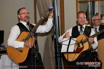 Grand-dad and dad gang up at their family wedding reception
