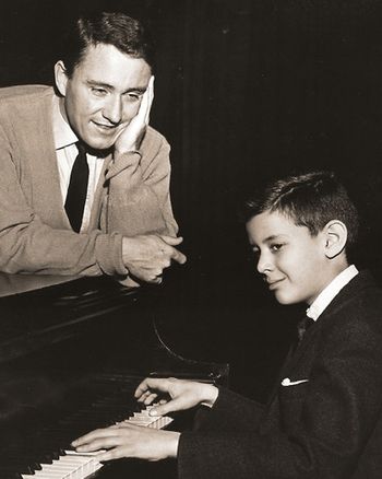 with Merv Griffin (ca. age 12)
