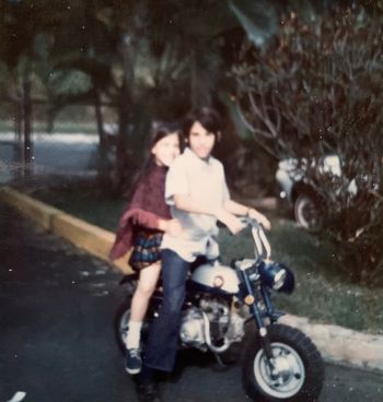 Polaroid of Ana & Martin Guigui on mini-bike in Puerto Rico as kids
