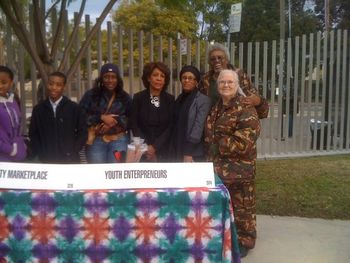 December 2011 at community outreach in Watts with Congresswoman Maxine Waters
