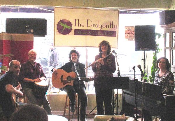 'For the 99' Band:
(l-r) Billy on bass, Linda on djembe, Shar, Diane on Flute n Sax and special guest Amy Clarkson on keyboard.

photo by Joe Galacki