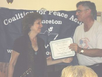 Receiving Peace Patriot Award from Rev. Robert Moore, Director of Coalition for Peace Action based in Princeton, New Jersey for cultural contribution to the Peace Movement - July 3, 2011
