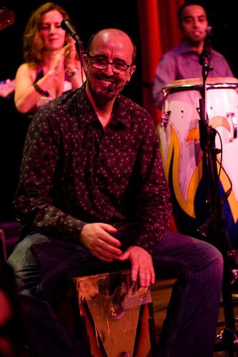 As Sandy and Julio watch, Edgardo plays Cajón for the Flamenco Salsa composition by Sandy Cressman: "Corazón."
