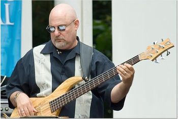 Master Bassist and also a Candela veteran, David Belove, taking a "serious" look at the chart!
