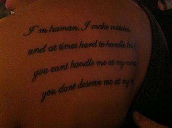 A lovely shoulder tattoo...The words are attributed to Marilyn Monroe.
