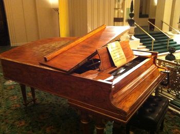Cole Porter's piano in the lobby of the Waldorf Astoria hotel in NYC
