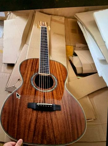 2023 Gruene Guitar - 00038K - Koa; custom build for Rick, pictured ready for quality control proofing period.
