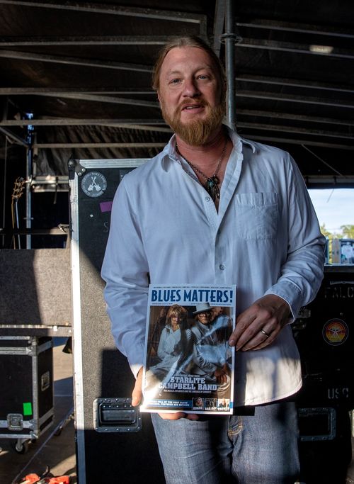 Derek Trucks with bnis copy of 'Blues Matters' featuring the Starlite Campbell Band on the front cover